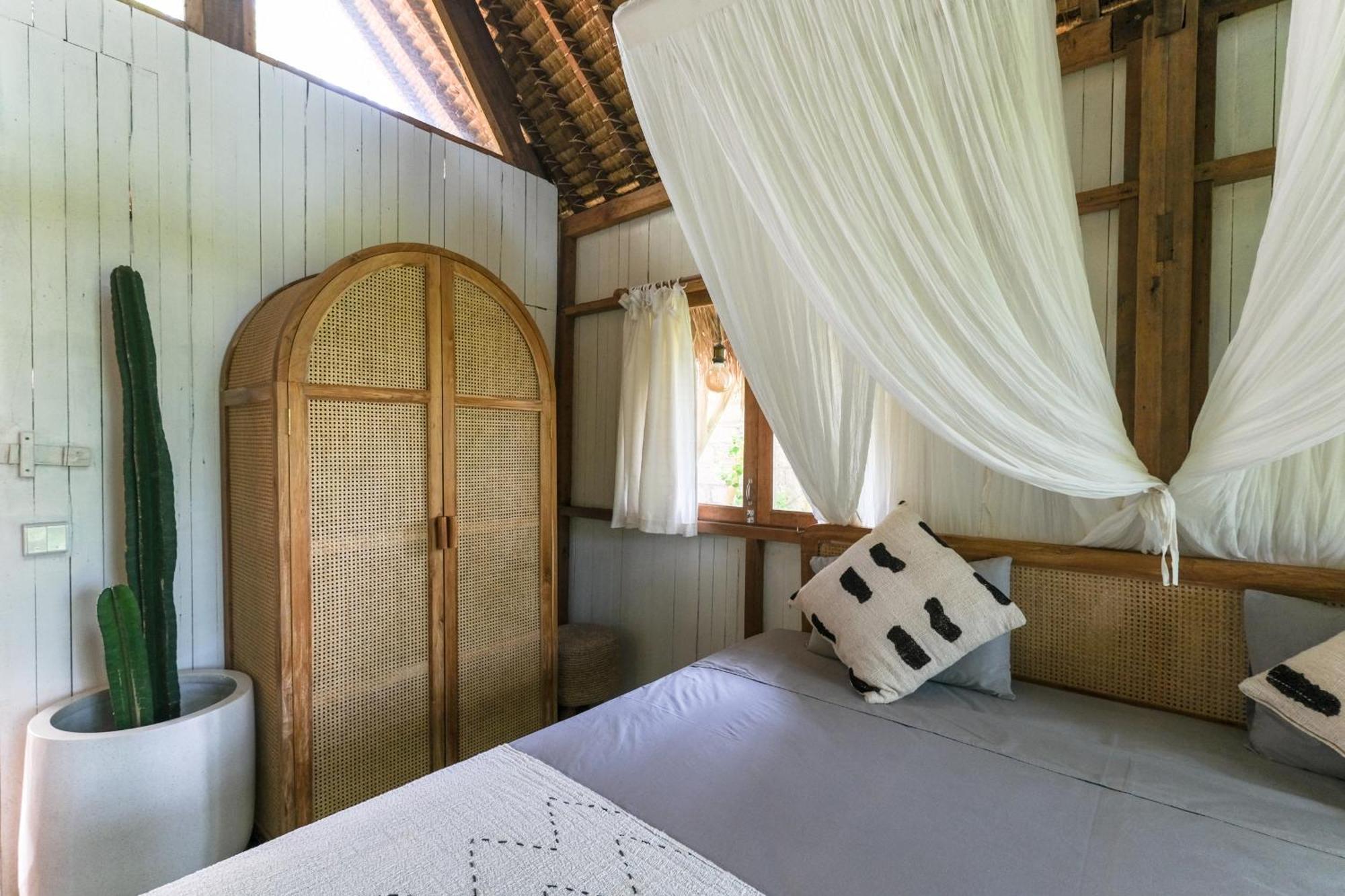 Готель Salty Breeze Bali Унґасан Номер фото